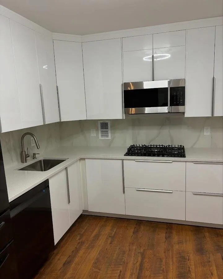 Restored kitchen with white cabinets after water damage in Dublin